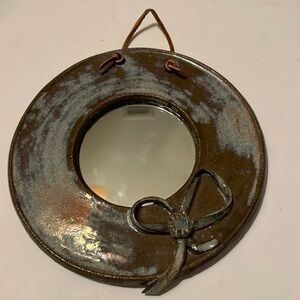 Round clay ceramic mirror